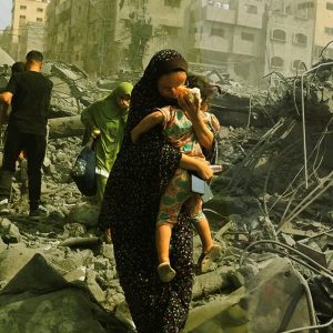 How Israel’s Supporters Play Victim to Justify Genocide & Silence Critics with Nora Barrows-Friedman