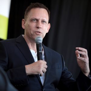Peter Thiel speaking with attendees at the 2022 Converge Tech Summit at The Waste Management Phoenix Open at the Skybar at TPC Scottsdale in Scottsdale, Arizona. Photo by Gage Skidmore