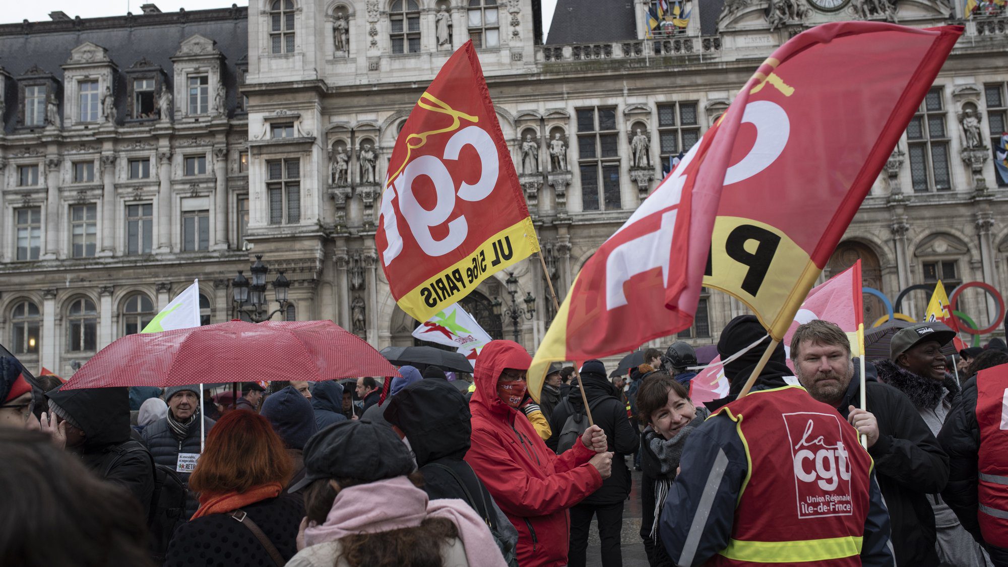 French workers take to the streets as Macron’s pension reform becomes law