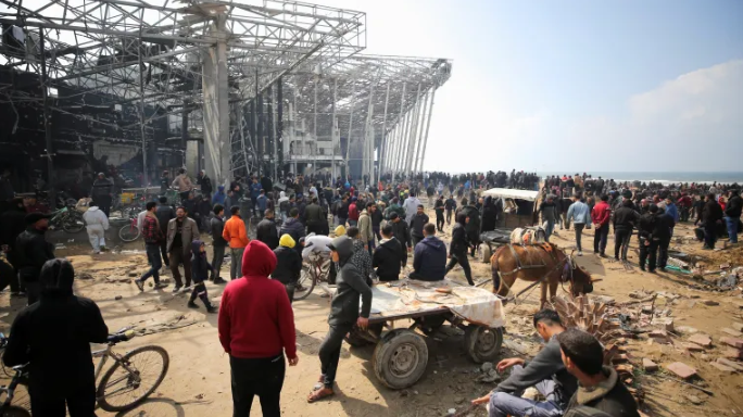 Israel kills over 100 Palestinians who were waiting for aid