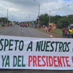 Banner demanding a change in president of INDI in Paraguay