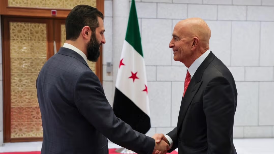 Syrian leader Ahmed al-Sharaa meets with U.S. Ambassador to Turkey Tom Barrack in Damascus, May 2025