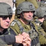 Israeli Prime Minister Benjamin Netanyahu (L) alongside senior Israeli officials tour the buffer zone on the Syrian side of the Israeli-occupied Golan Heights on November 19, 2025.