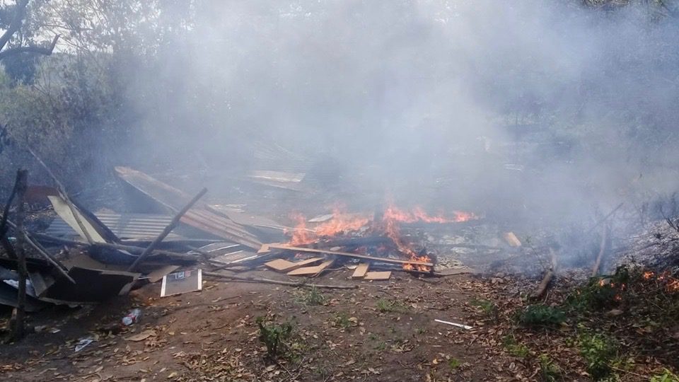 South African security personnel demolish two settlements housing poor urban families