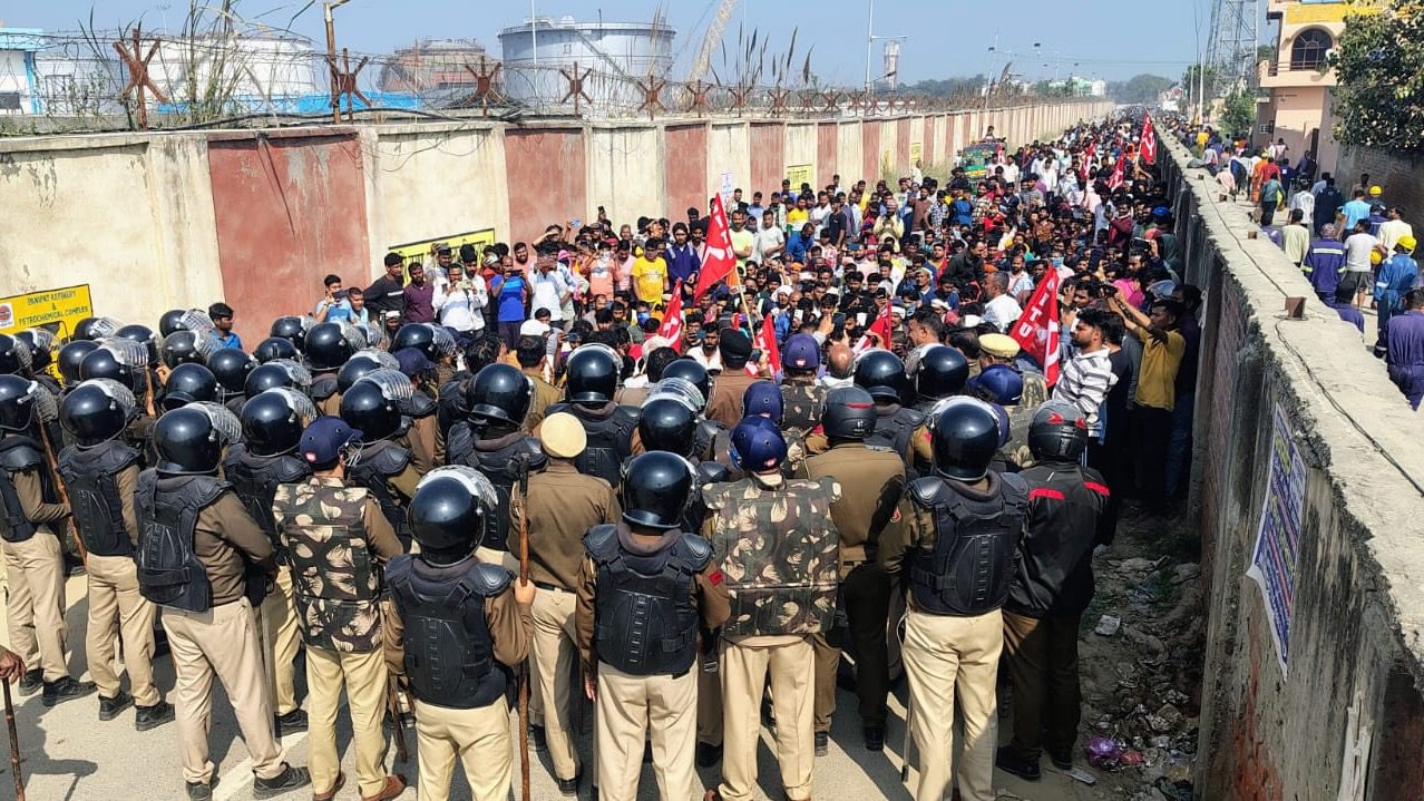 Sit-in demonstration during strike in india against 12 hour work day