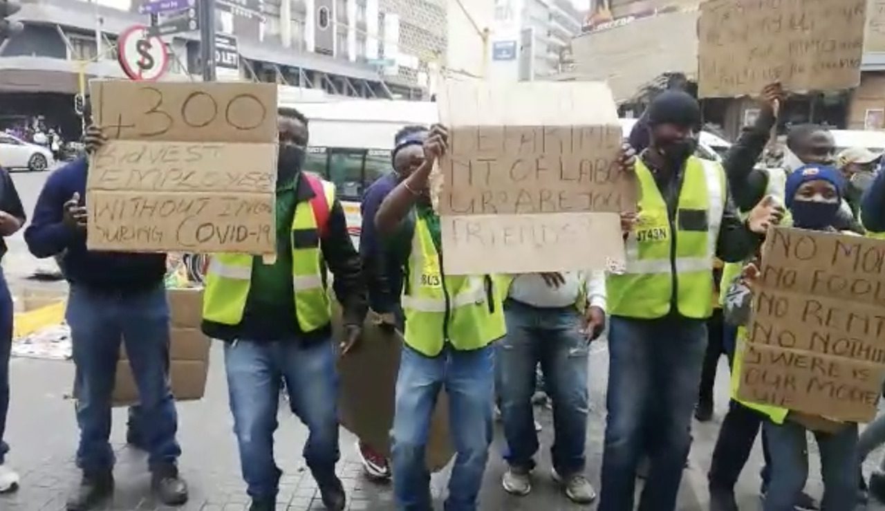 Employees of South African airport services firm protest demanding payment of salaries