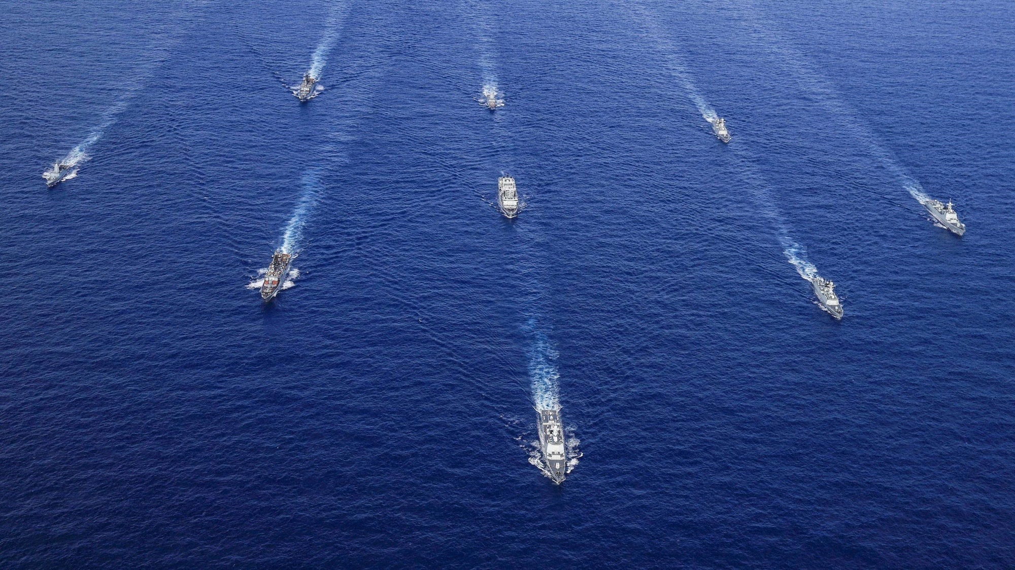 fleet of maritime vessels on the ocean