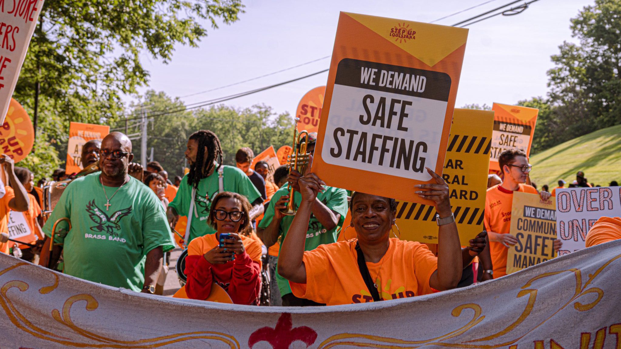Overworked and understaffed Dollar General workers rally against cost-cuts on safety