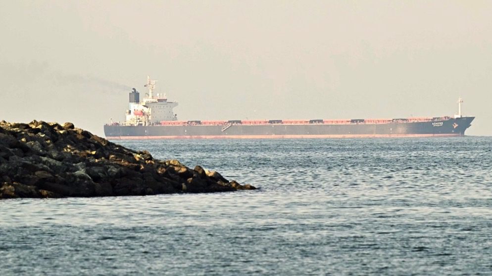 A cargo ship is pictured off coast city of Fujairah, in the Strait of Hormuz in the northern Emirate on February 25, 2026