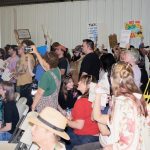 People raise signs against data center