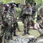 US soldiers speak to soldiers of the Ghana Army