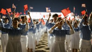 china-us-arrival - BT News Chinese youth wave Chinese and US flags