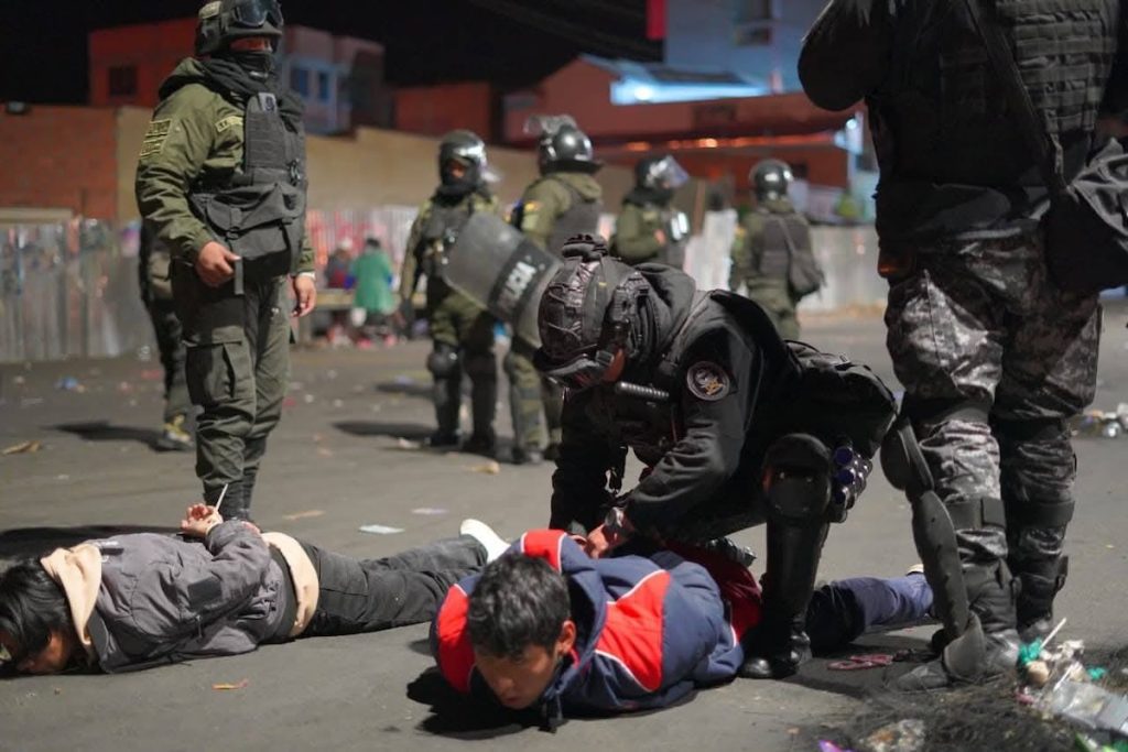 covid 19 mexico - BT News police arresting protesters Bolivia